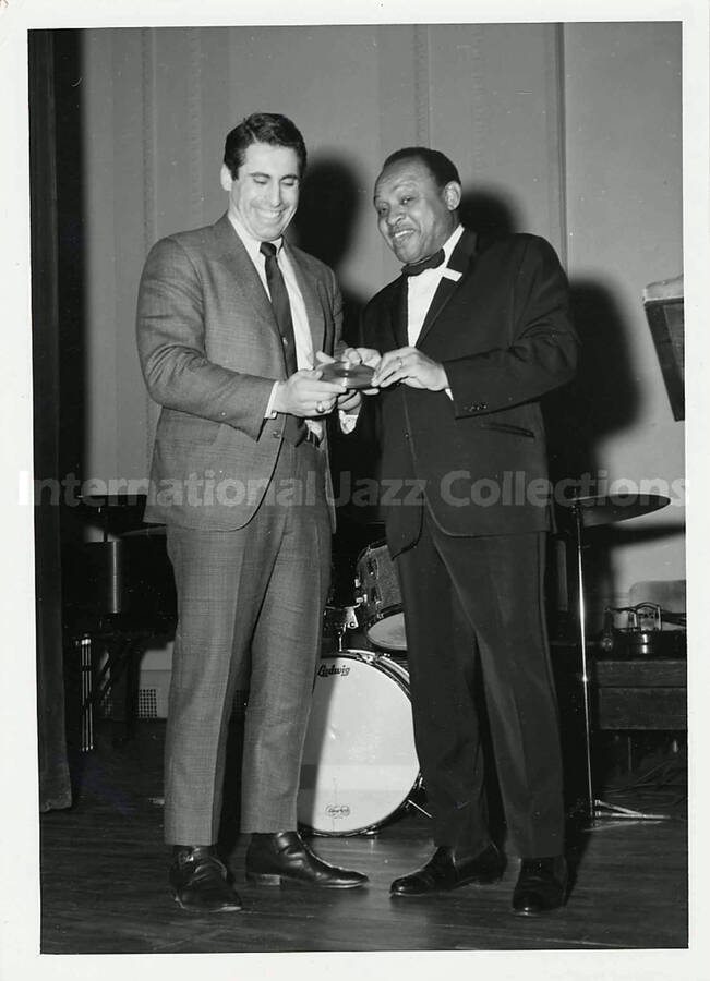 7 x 5 inch photograph. Lionel Hampton with unidentified man. New York, NY