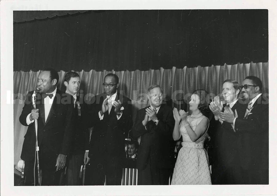 5 x 7 inch photograph. Lionel Hampton with unidentified persons