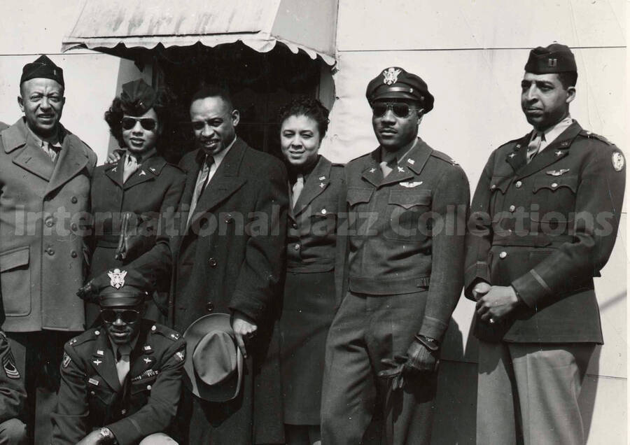 8 x 10 inch photograph. Lionel Hampton with Army Air Force personnel