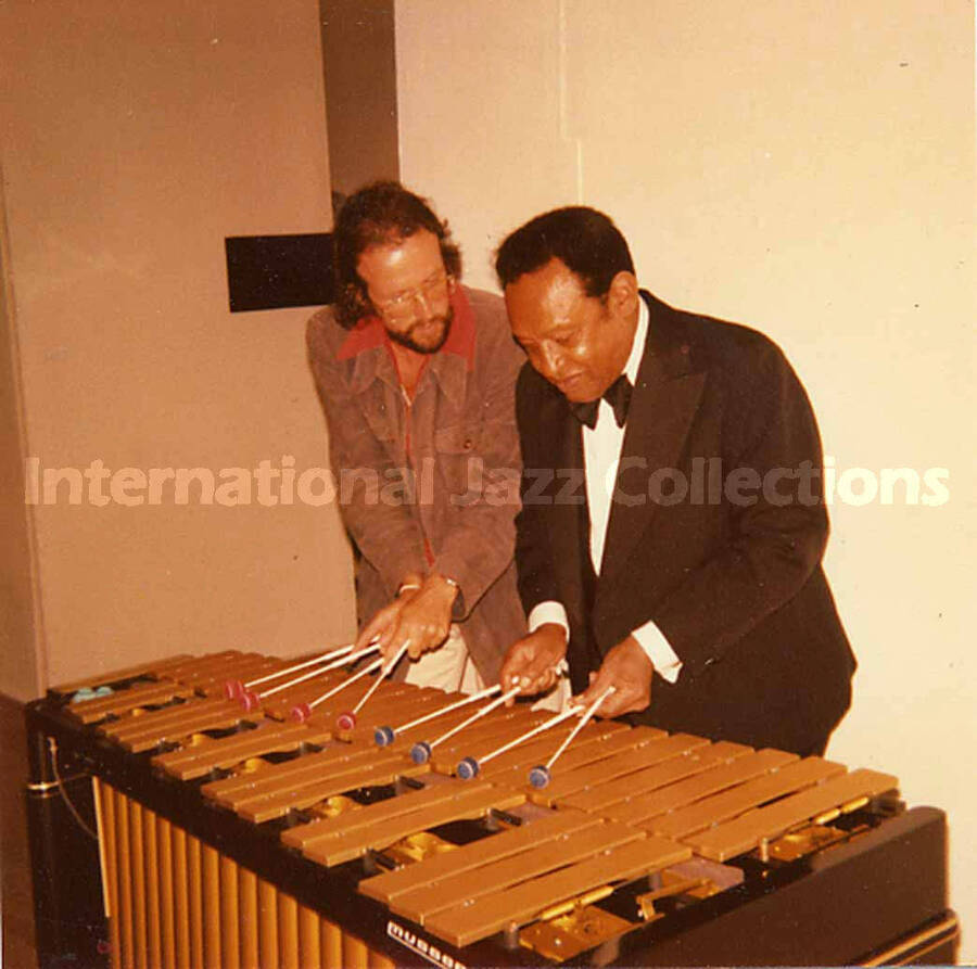 3 1/2 x 3 1/2 inch photograph. Lionel Hampton and Jean Claude Forestier playing the vibraphone