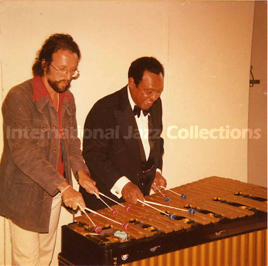 3 1/2 x 3 1/2 inch photograph. Lionel Hampton and Jean Claude Forestier playing the vibraphone