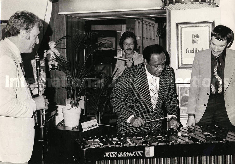 12 x 8 1/2 inch photograph. Lionel Hampton playing the vibraphone at the Castle Hotel, in Sweden. A name on the vibraphone reads: Lars Erstrand