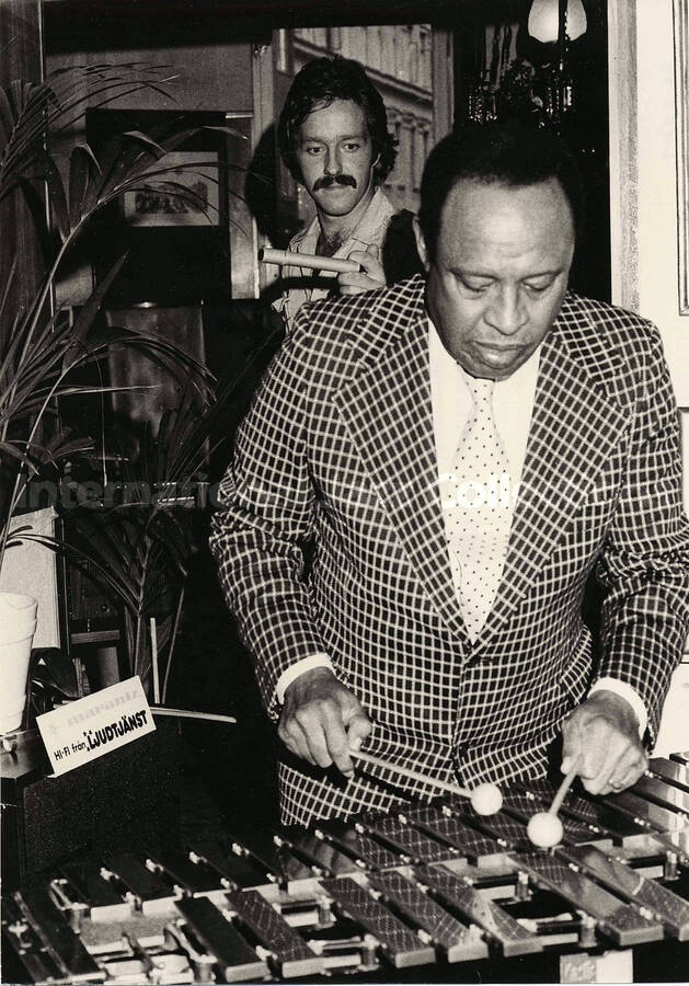 12 x 8 1/2 inch photograph. Lionel Hampton playing the vibraphone at the Castle Hotel, in Sweden