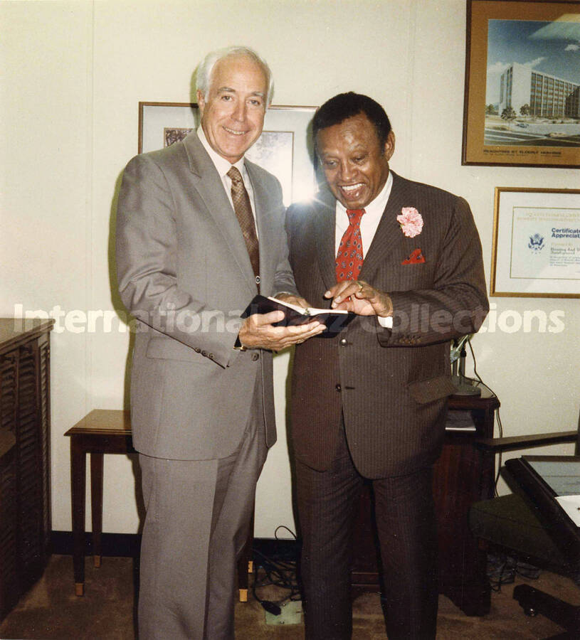 8 3 /4 x 8 inch photograph. Lionel Hampton with unidentified man