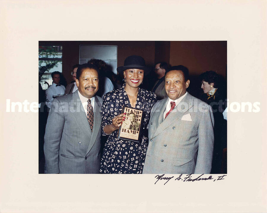 8 x 10 inch photograph. Lionel Hampton at the signing of his recently published book: Hamp: an autobiography, co-authored with James Haskins