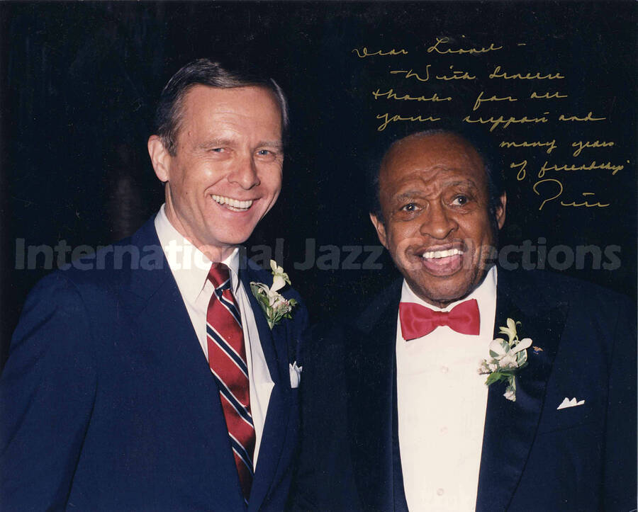 8 x 10 inch photograph. Lionel Hampton with Governor of California Peter Wilson. This photograph is dedicated to Lionel Hampton