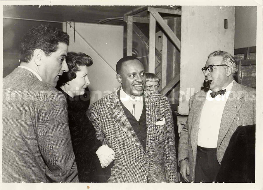 5 x 7 inch photograph. Lionel Hampton with unidentified persons [abroad?]