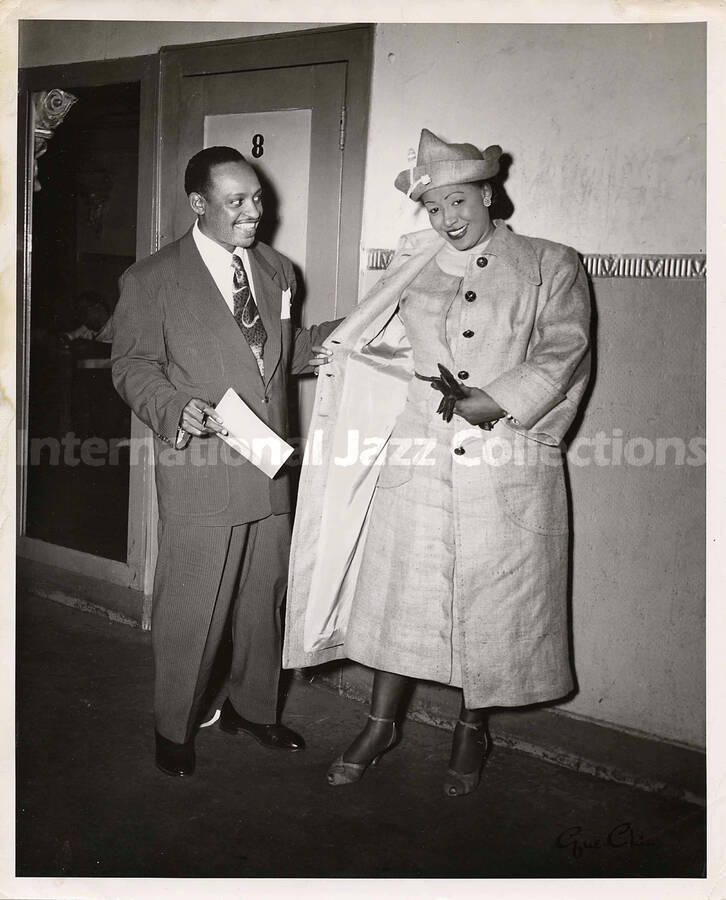 8 x 10 inch photograph. Lionel Hampton with unidentified woman