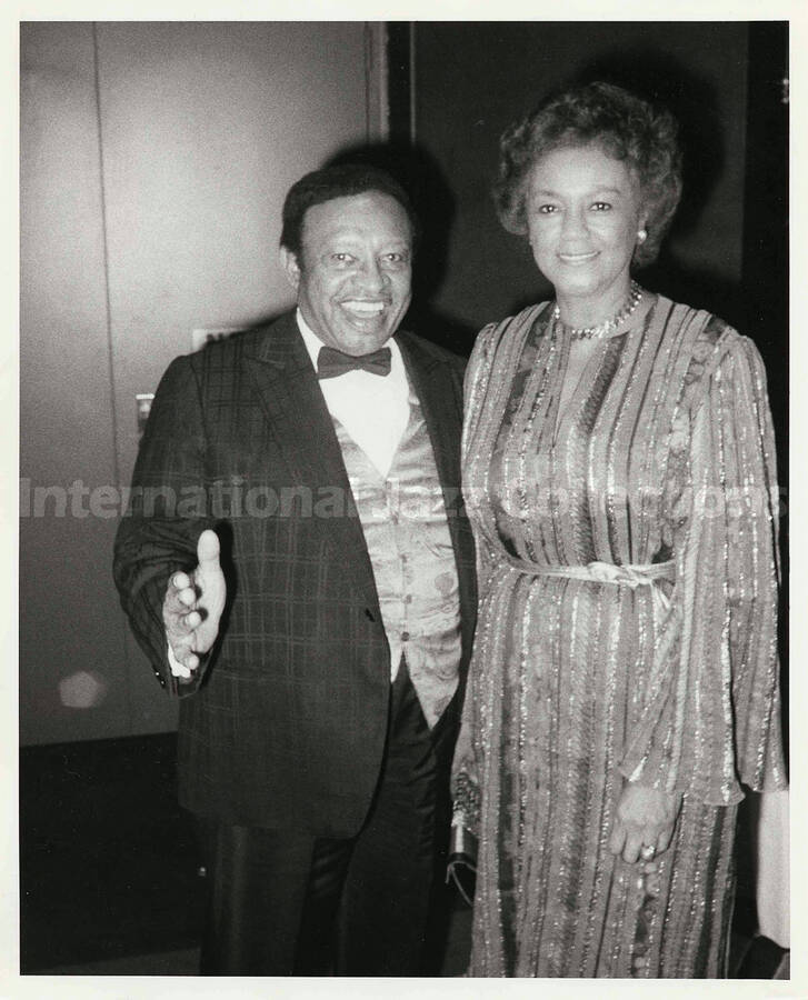 10 x 8 inch photograph. Lionel Hampton with unidentified woman, on the occasion of his receiving the Henri M. Deas Award for Community Service presented by the Opportunities Industrialization Center of New York