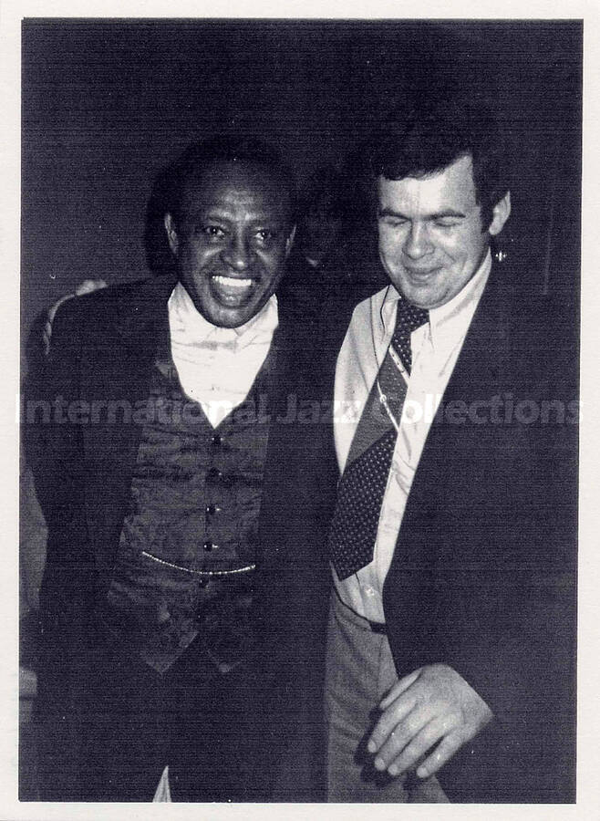 7 3/4 x 5 1/2 inch photograph. Lionel Hampton with unidentified man. This is a photocopy of a photograph