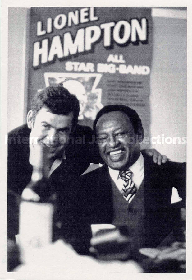 7 3/4 x 5 1/2 inch photograph. Lionel Hampton with unidentified man. This is a photocopy of a photograph