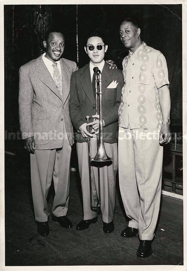 7 x 5 inch photograph. Lionel Hampton with trombonist Paul Higaki and unidentified man