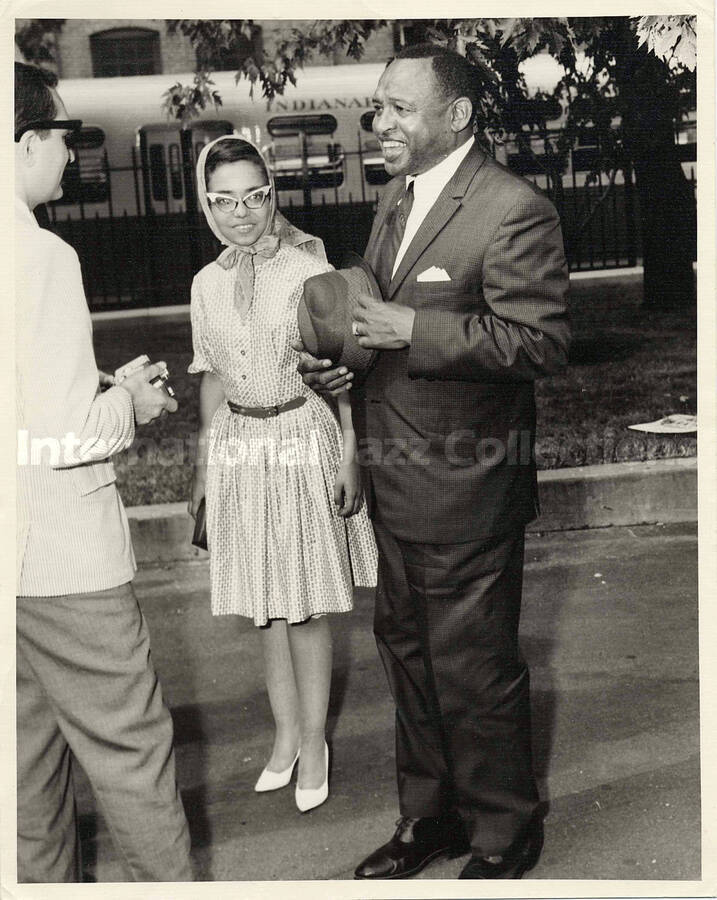 10 x 8 inch photograph. Lionel Hampton with unidentified persons in Indianapolis, IN