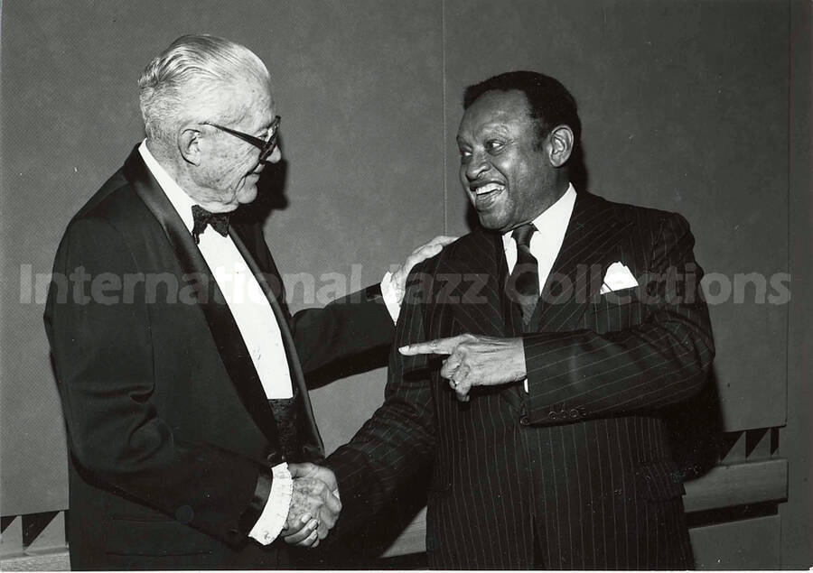5 x 7 inch photograph. Lionel Hampton with unidentified man