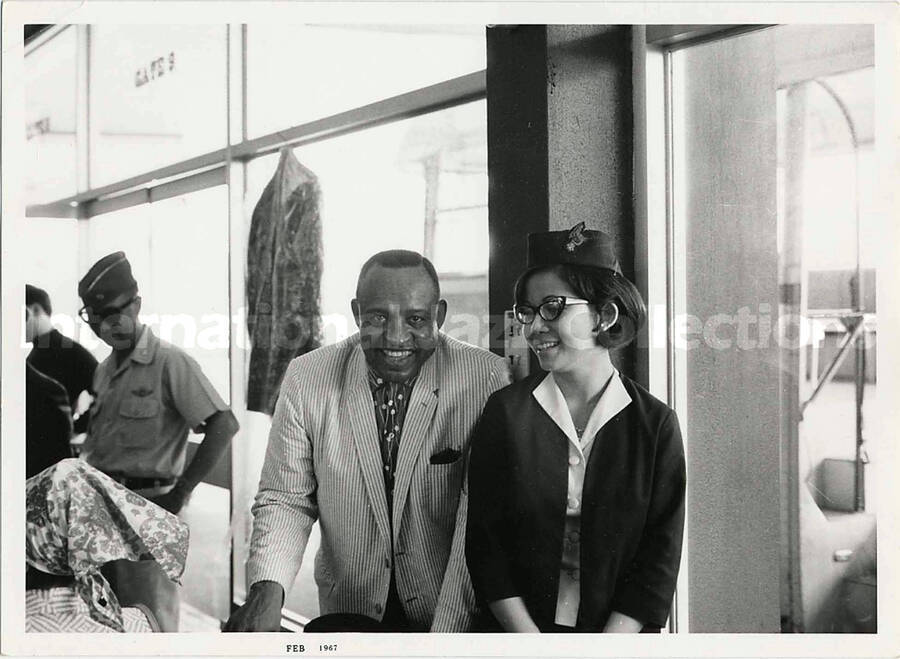 4 3/4 x 6 1/2 inch photograph. Lionel Hampton with unidentified woman