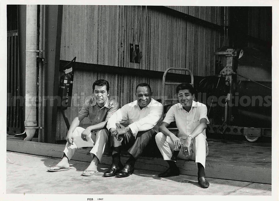 4 3/4 x 6 1/2 inch photograph. Lionel Hampton with unidentified men