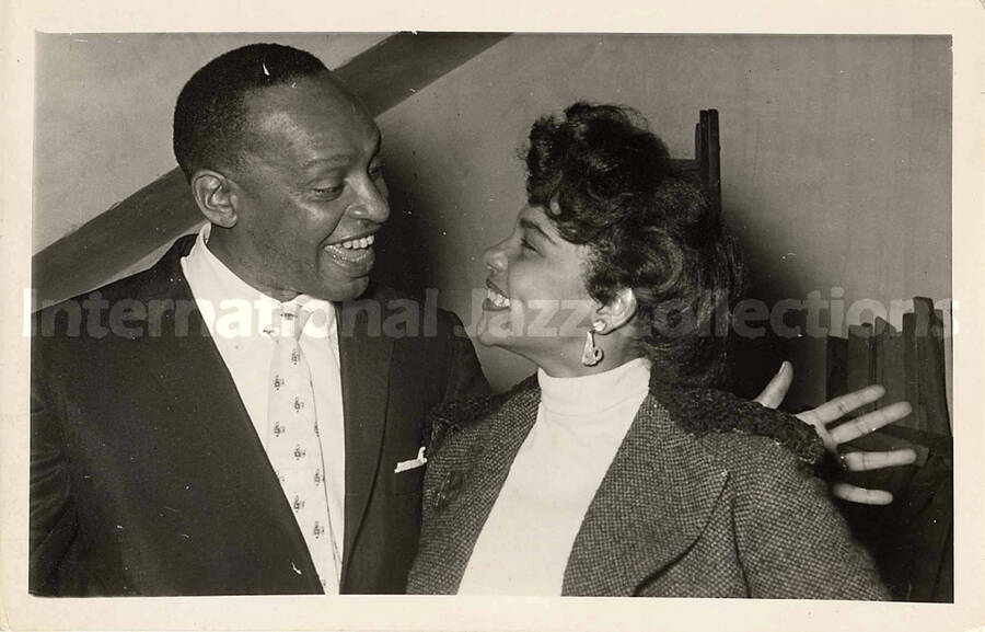 4 1/2 x 7 3/4 inch photograph. Lionel Hampton with unidentified woman
