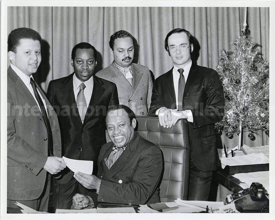 7 1/2 x 9 1/2 inch photograph. Lionel Hampton with unidentified men