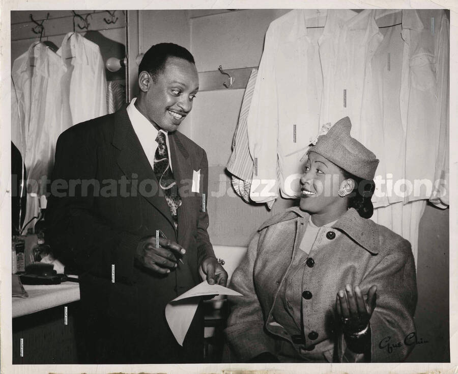8 x 10 inch photograph. Lionel Hampton with unidentified woman