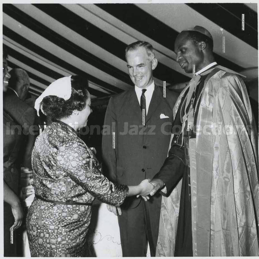 3 1/2 x 3 1/2 inch photograph. Unidentified religious man [at the 48th Annual Convention Knights and Ladies of St. Peter Claver?]
