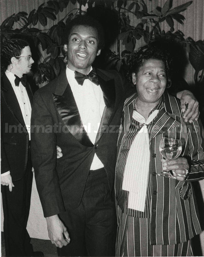 10 x 8 inch photograph. Unidentified man and woman, on the occasion that Lionel Hampton received a plaque from the United States Mission that appointed him as Ambassador of Music to the United Nations