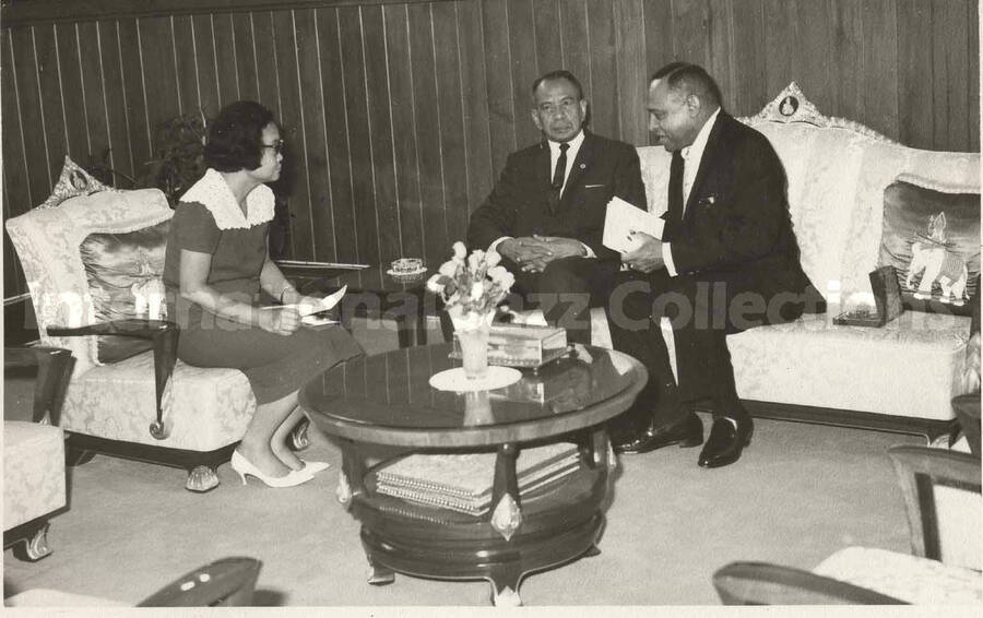 3 1/2 x 5 1/2 inch photograph. Lionel Hampton with Pol. Col Luen Krisanamara Asst. Lord Mayor of Bangkok (Thailand) and City Clerk Mrs. Nandaka Wattanakorn