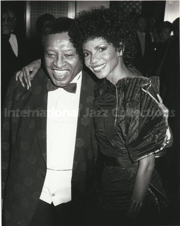 10 x 8 inch photograph. Lionel Hampton with unidentified woman