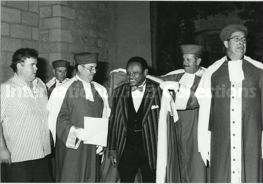 5 1/2 x 8 inch photograph. Lionel Hampton on the occasion of his receiving a certificate [in France?]