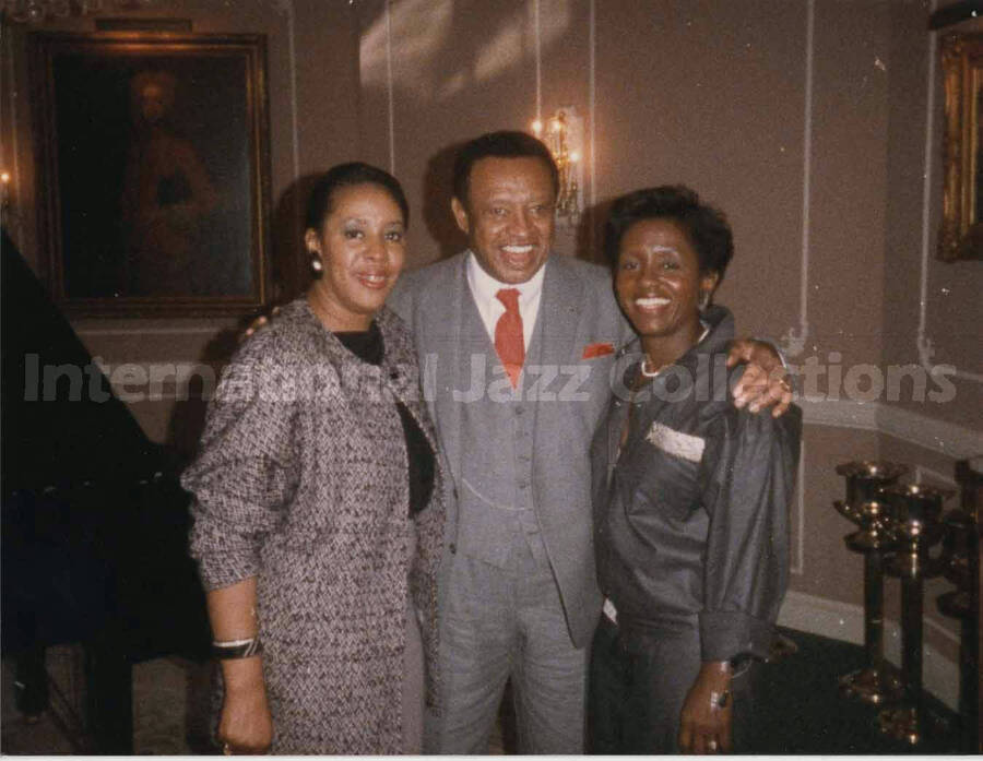 3 1/2 x 4 1/2 inch photograph. Lionel Hampton with unidentified women