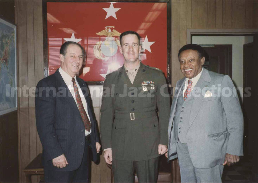 3 1/2 x 5 inch photograph. Lionel Hampton with two unidentified men; one is in a Marine Corps uniform