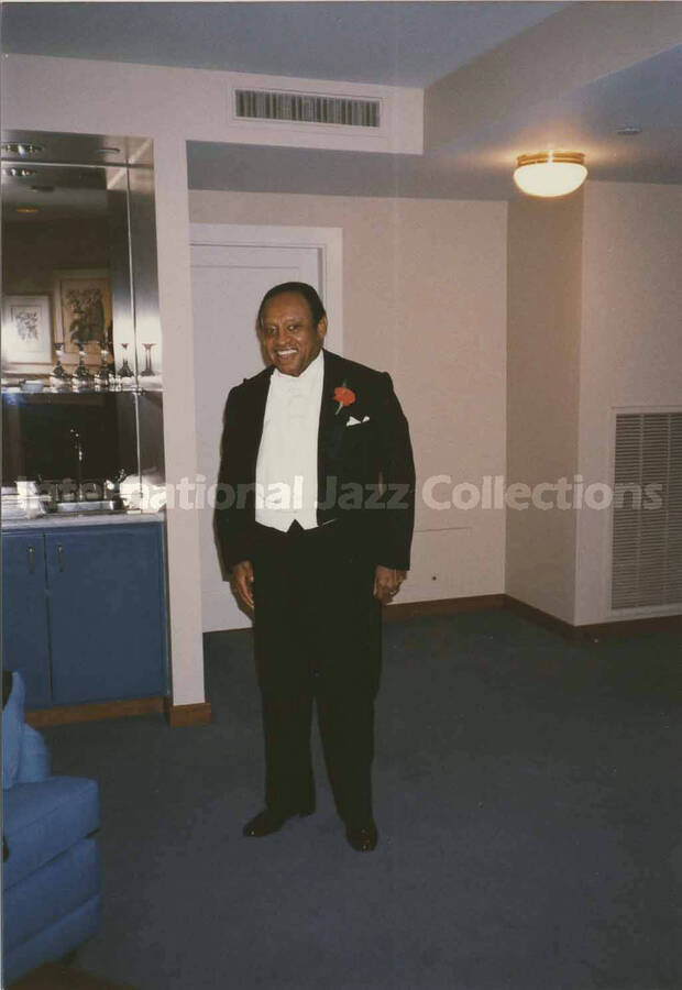 5 x 3 1/2 inch photograph. Lionel Hampton at a wedding dinner