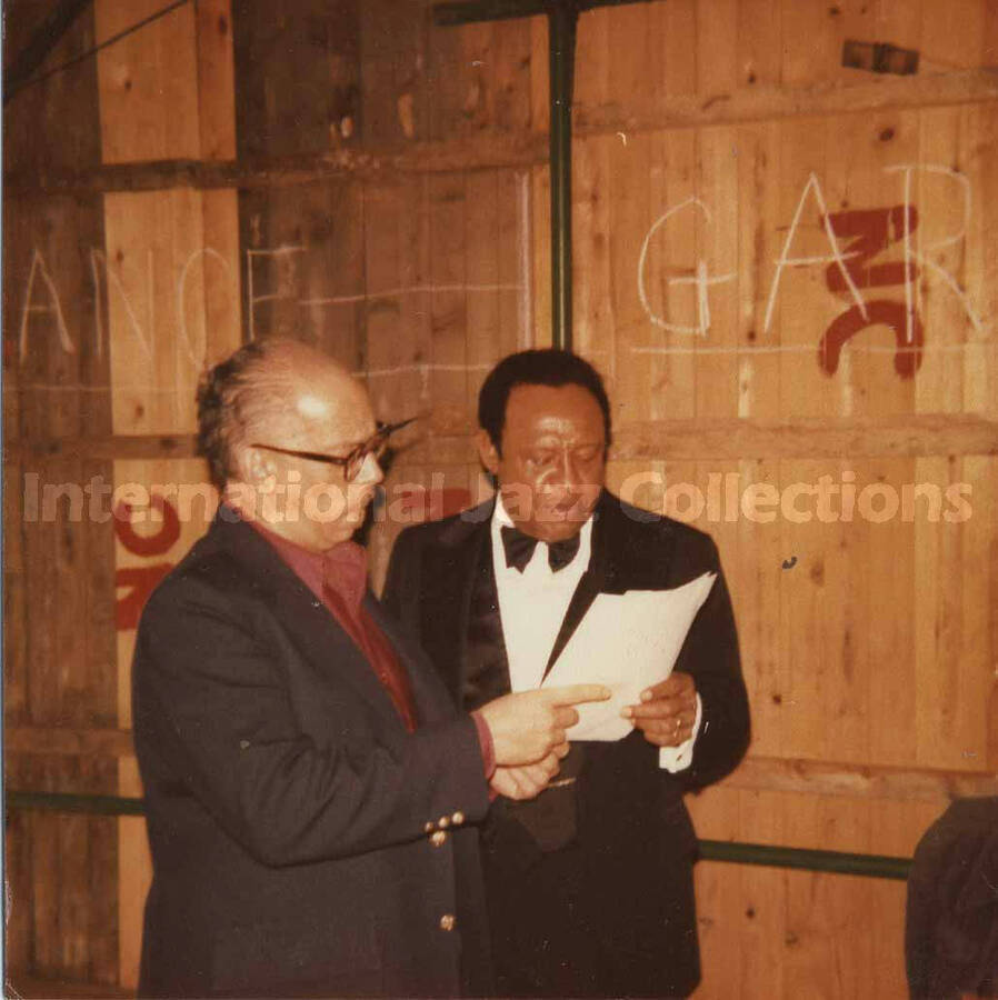 3 1/2 x 3 1/2 inch photograph. Lionel Hampton with unidentified man