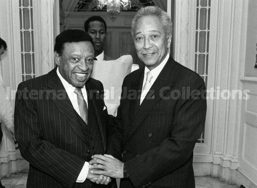 8 x 10 inch photograph. Lionel Hampton with David Norman Dinkins, Mayor of New York City. This photograph is dedicated to Lionel Hampton by Dave
