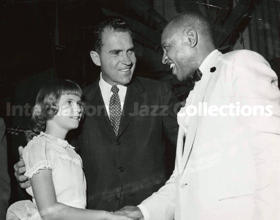 8 x 10 inch photograph. Lionel Hampton with Richard Nixon and his daughter Tricia