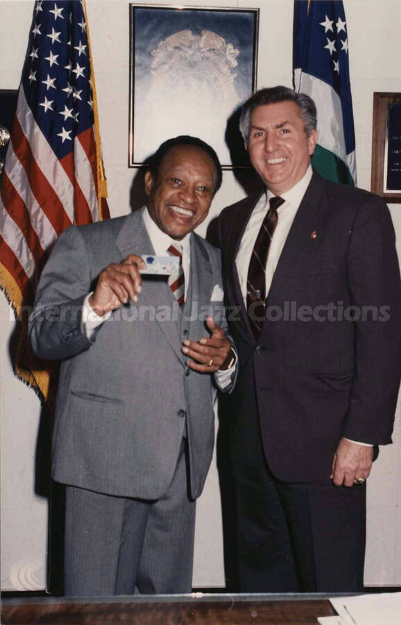 7 x 5 inch photograph. Lionel Hampton with chief of detectives, Robert Colangelo, during his visit to the New York City Police Department