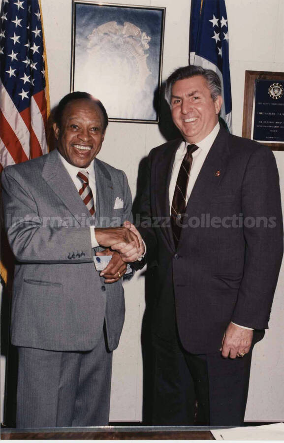 7 x 5 inch photograph. Lionel Hampton with chief of detectives, Robert Colangelo, during his visit to the New York City Police Department