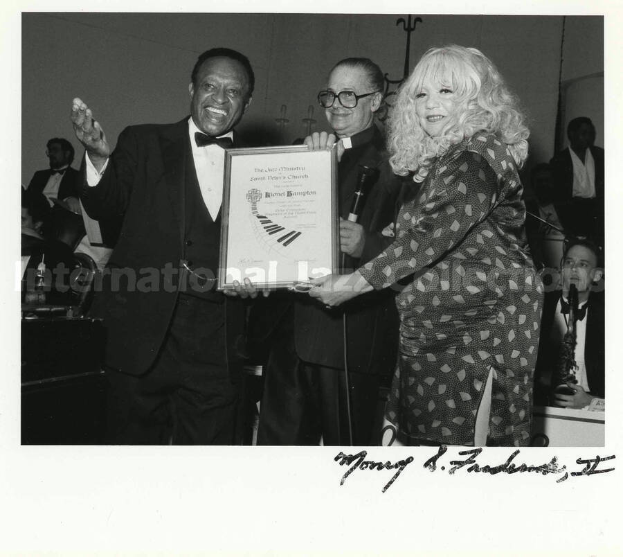 8 x 10 inch photograph. Lionel Hampton receiving the Duke Ellington/Shepherd of the Night Flock Award, presented by the Jazz Ministry at Saint Peter's Church, in New York, NY