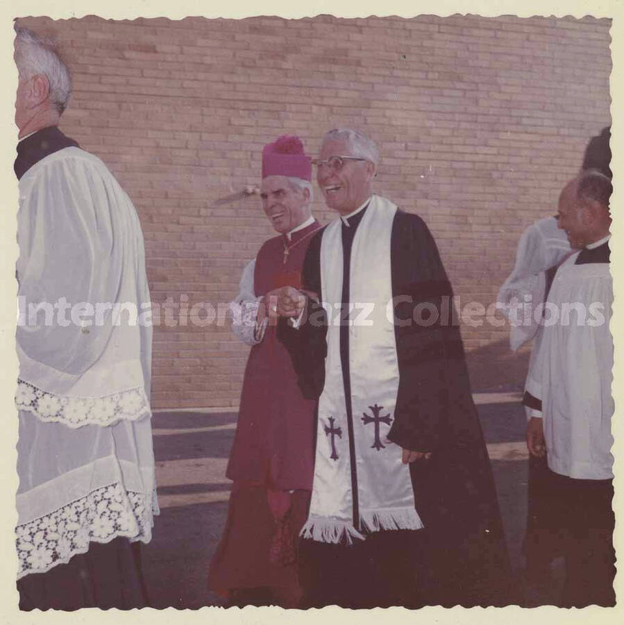 3 1/2 x 3 1/2 inch photograph. Handwritten on the back of the photograph: Bishop [Fulton] Sheen and Bishop Ranes[?] (Methodist) [at the 48th Annual Convention Knights and Ladies of St. Peter Claver?]
