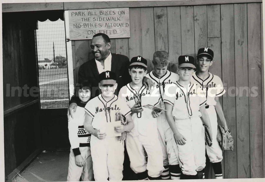5 x 7 inch photograph. Lionel Hampton poses with the boys of the Margate Little League Baseball Team, New Jersey