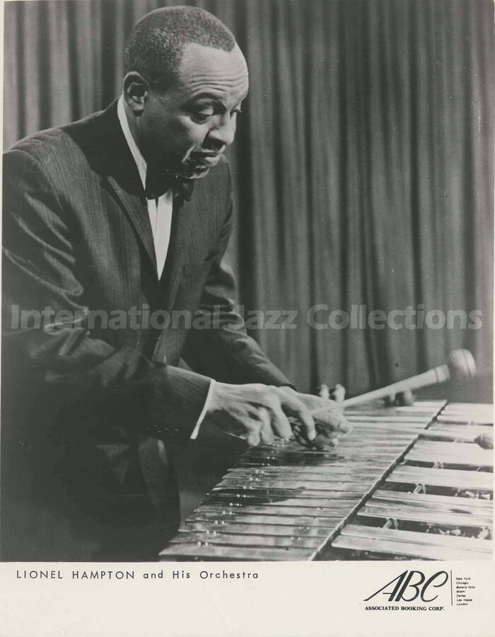 10 x 8 inch promotional photograph. Lionel Hampton playing the vibraphone