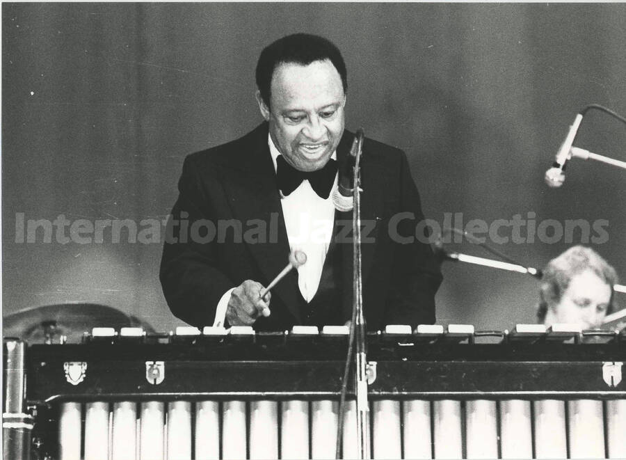 7 x 9 1/2 inch photograph. Lionel Hampton playing the vibraphone
