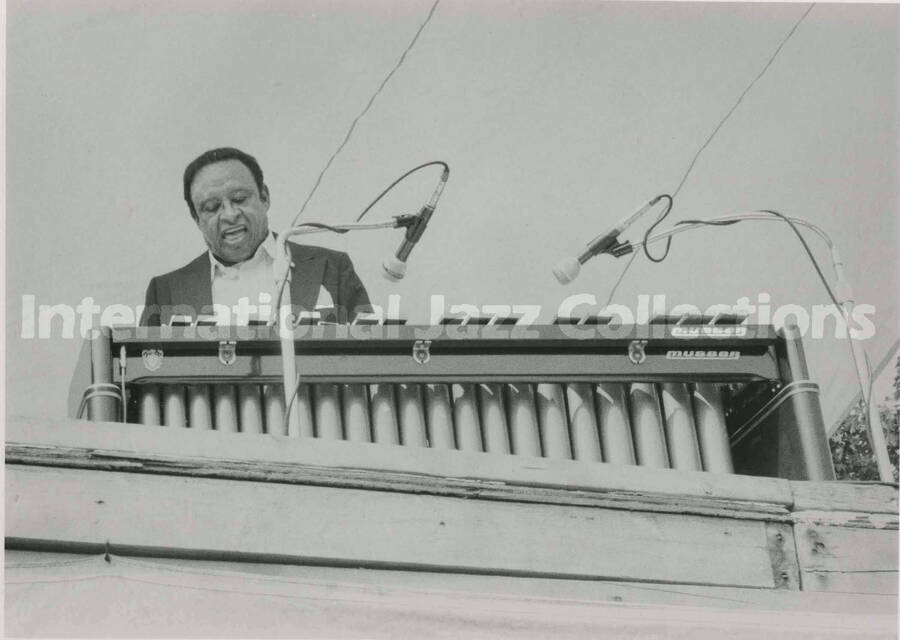 6 x 7 1/2 inch photograph. Lionel Hampton playing the vibraphone at an outdoor concert
