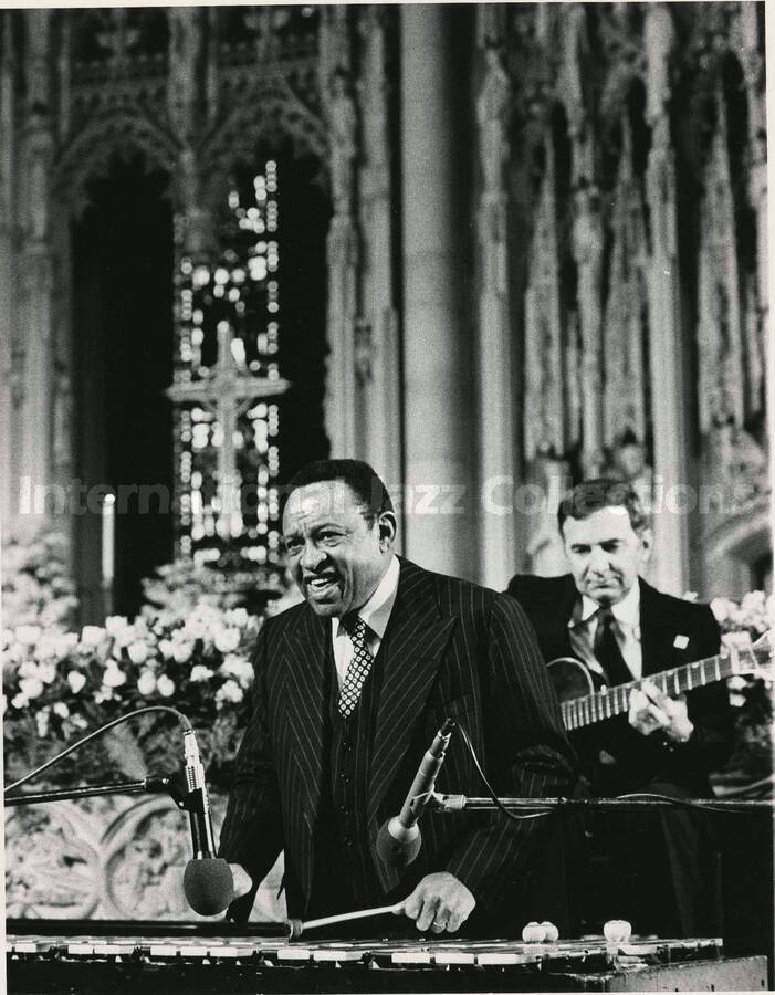 10 x 8 inch photograph. Lionel Hampton playing the vibraphone [in a cathedral?]