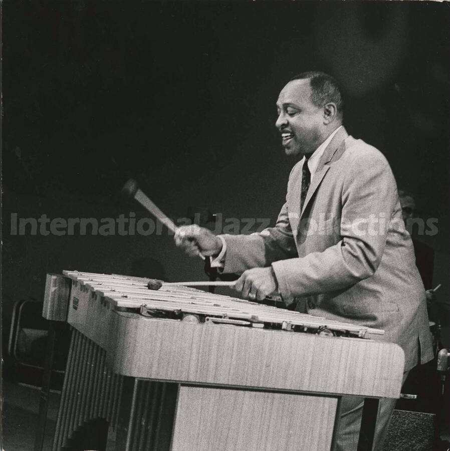 8 x 8 inch photograph. Lionel Hampton playing the vibraphone