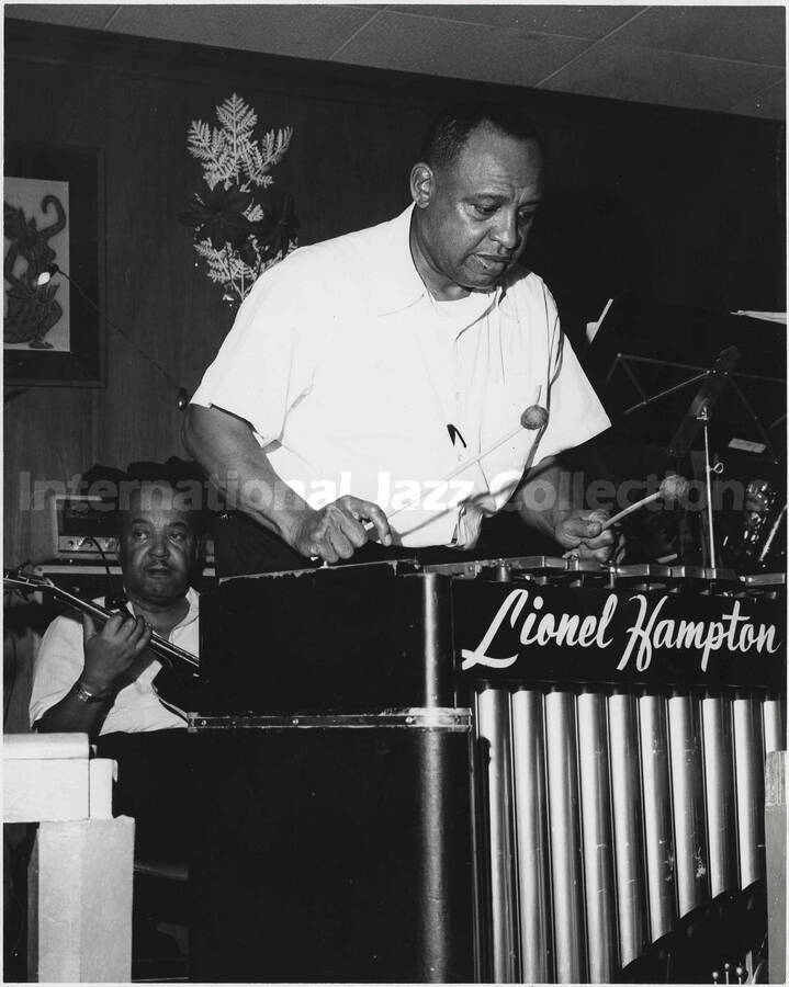 10 x 8 inch photograph. Lionel Hampton playing the vibraphone [at an U.S. Air Force base abroad?]