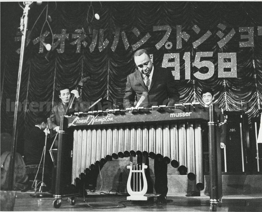 8 x 10 inch photograph. Lionel Hampton performing on the vibraphone [in Japan]