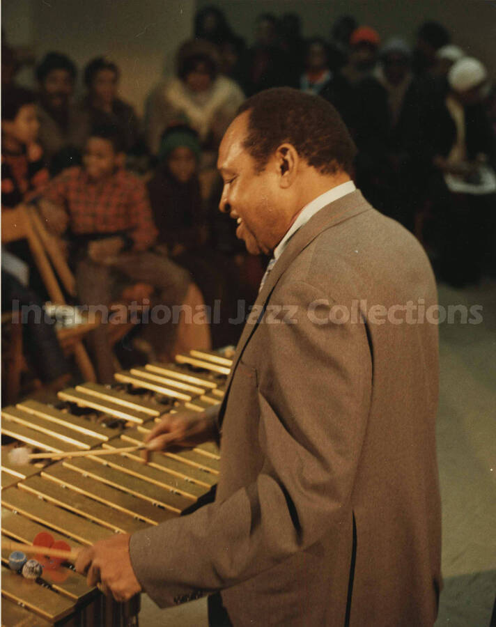 10 x 8 inch photograph. Lionel Hampton playing the vibraphone
