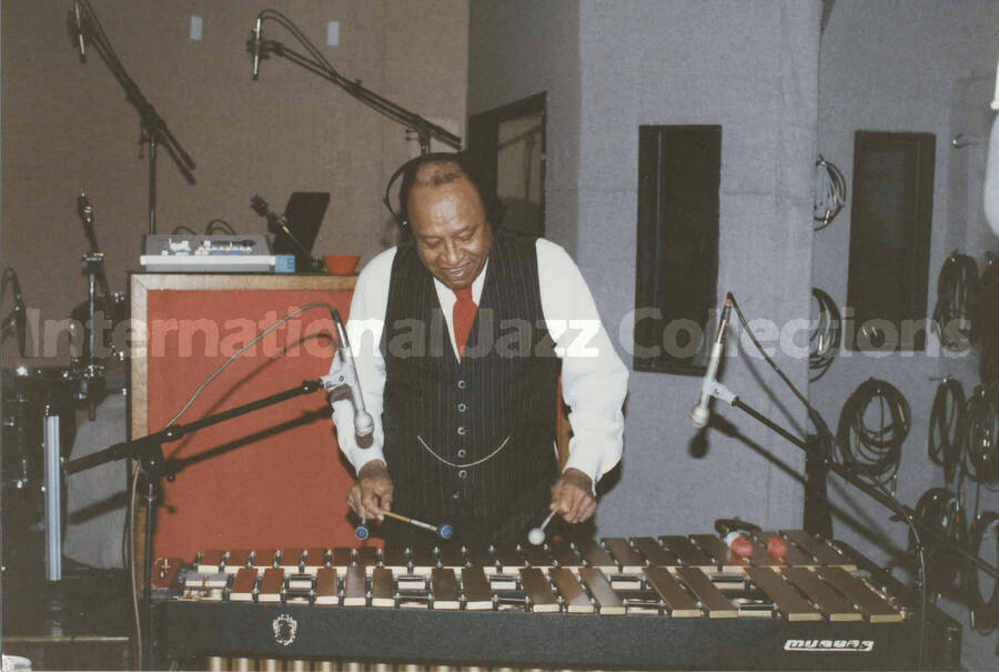 4 x 6 inch photograph. Lionel Hampton recording with Sylvia Bennett