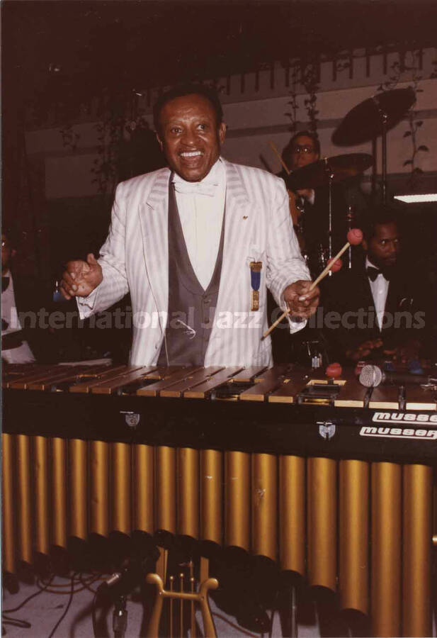 5 x 3 1/2 inch photograph. Lionel Hampton playing the vibraphone