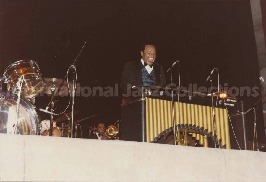 4 x 6 photograph. Lionel Hampton playing the vibraphone. Stamped on the back of the photograph: U.S.A. Jazz Sessions Club, Antwerp, Belgium